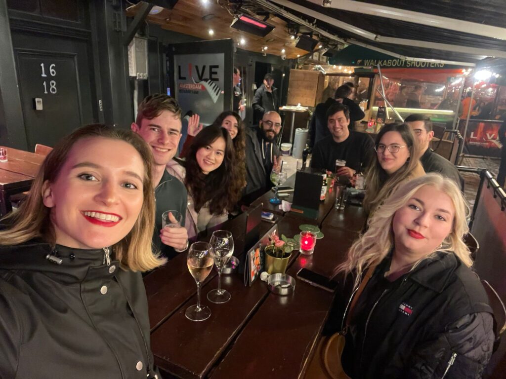 ISU alumna student with friends in Netherlands