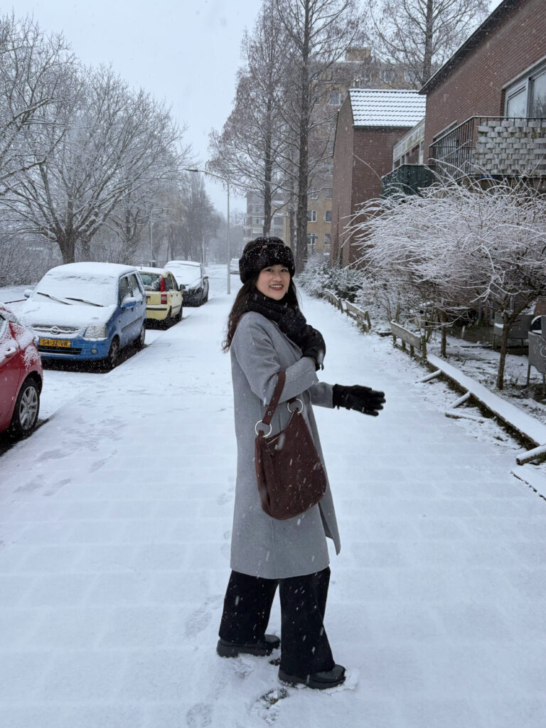 ISU alumna student with friends in Netherlands